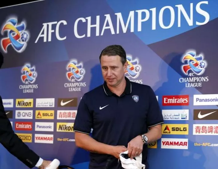 Saudi Arabia's Al Hilal Football Club coach Laurentiu Reghecampf arrives at a news conference before AFC Champions League final match against the Western Sydney Wanderers in Sydney
