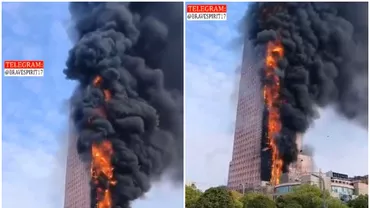 Video Incendiu puternic la un zgarienori din centrul Chinei Oamenii sunt prinsi inauntru