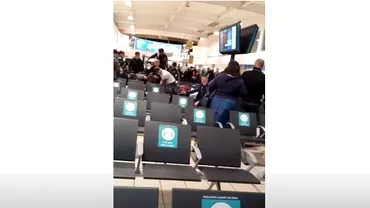Bataie can filme intre romani pe un aeroport din Londra Politia a arestat 17 persoane Video