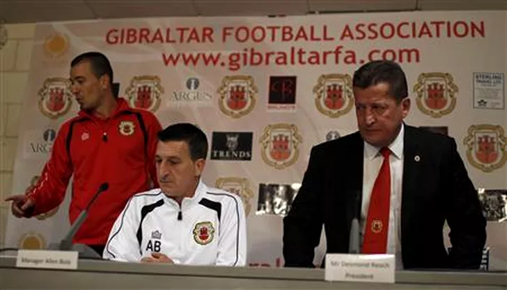 Gibraltar's coach Bulla, captain Chipolina and Gibraltar Football Association President Reoch arrive for a news conference at Algarve stadium near Faro