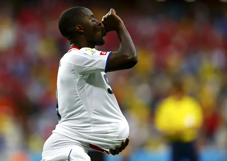 Costa Rica's Campbell celebrates with the match ball after scoring against Uruguay during their 2014 World Cup Group D soccer match at the Castelao stadium in Fortaleza