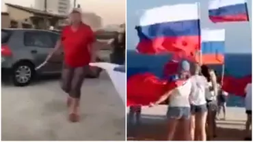 Video Un grup de rusi din Cipru amenintati de o ucraineanca inarmata cu un cutit Oamenii sarbatoreau Ziua Drapelului