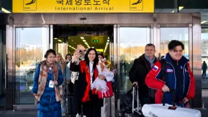 FOTO Primii turiști ruși tocmai s-au întors din vacanța la schi în Coreea...
