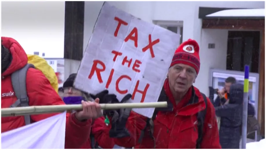 Protest inedit la Davos Un milionar cere taxe mai mari pentru bogati Sunt fericit sa platesc mai mult